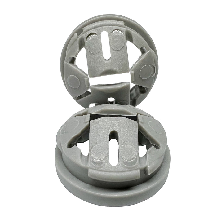 Pair of Dicio knockout Romex connectors showcasing easy snap installation