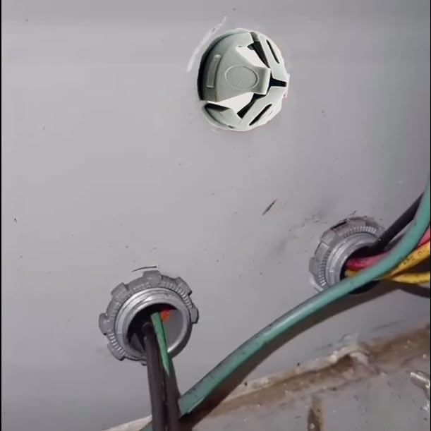 Close-up of electrical wiring with connectors on a metallic surface